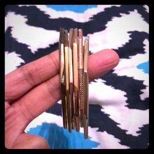 Kendra Scott gold and rose gold bangles